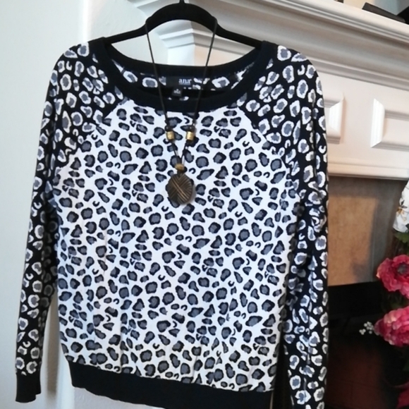 a.n.a Sweaters - 100. a.n.a Ladies animal print Sweater, Sz. M Like new condition.
